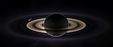 Saturn in a full solar eclipse with Earth barely visible Solar eclipse of Saturn